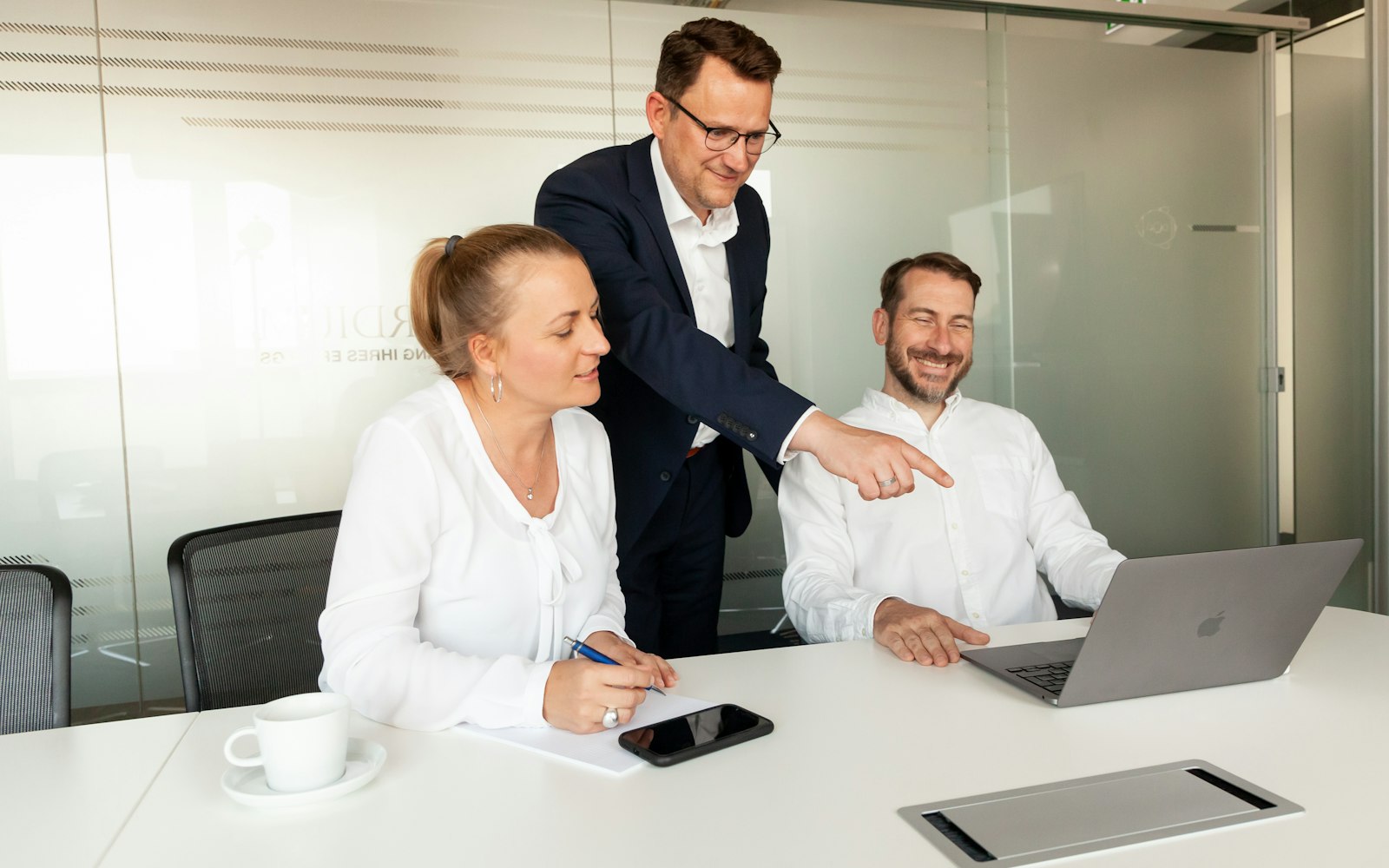 Prowess team and client reviewing project details together