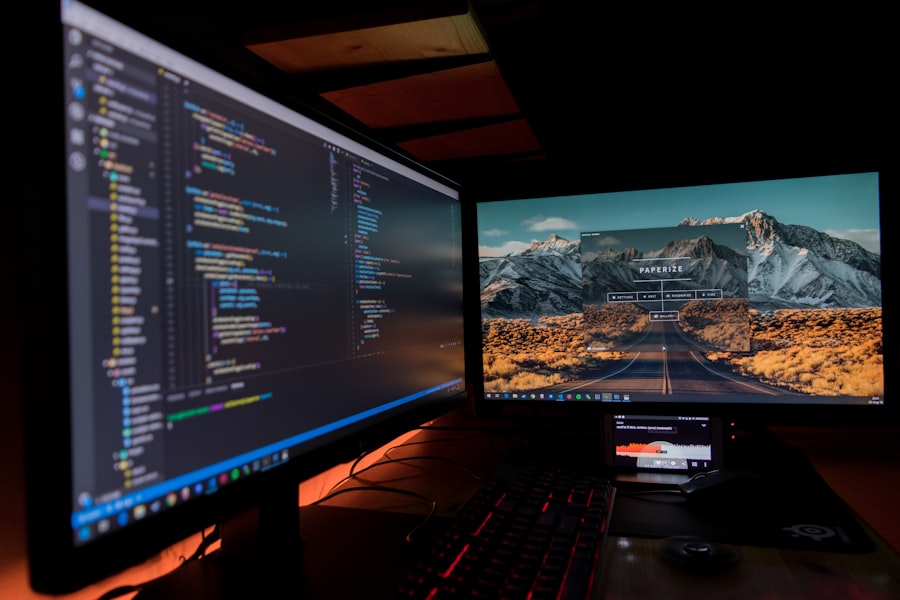 Dual-monitor coding setup at night, representing the Fitness Class Booking App project